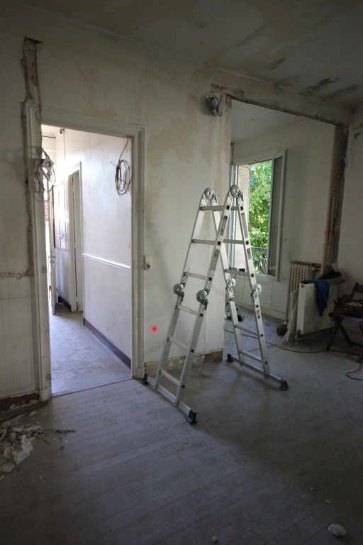 Renovate an old house - how to knock down a wall to create a big living space with kitchen and living room