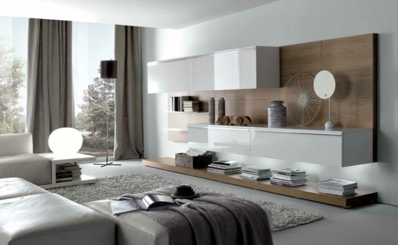 utiliser des meubles blancs brillant ou laqué apportera plus de luminosité et de lumière à une pièce ou un intérieur sombre et peu lumineux