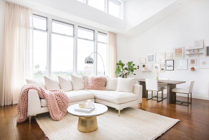 small touches of nude pink in a home with accessories like blankets, cushions or small decorative objects